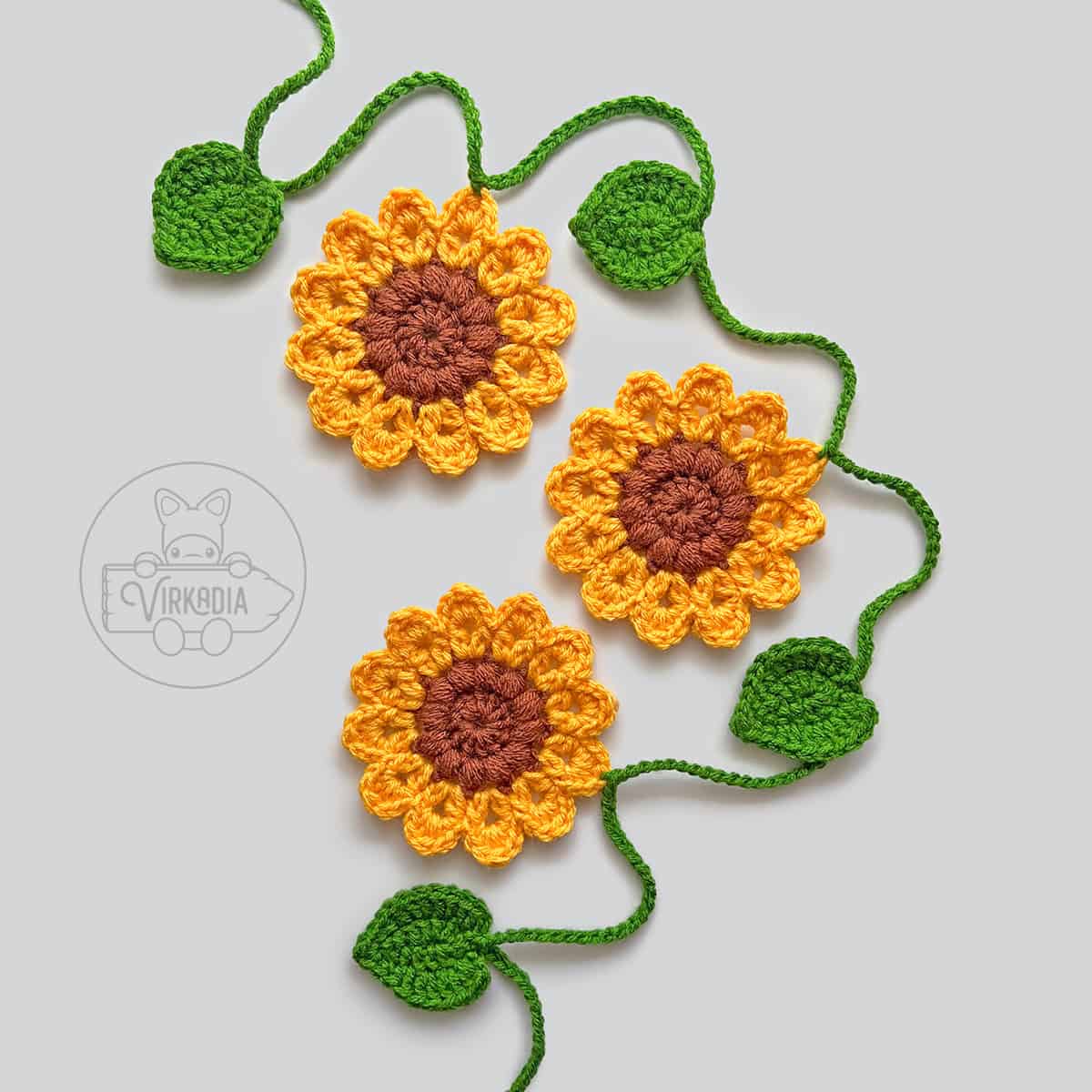 free crochet sunflower garland pattern for DIY fall decor, summer crafts, wedding decorations, and handmade holiday gifts