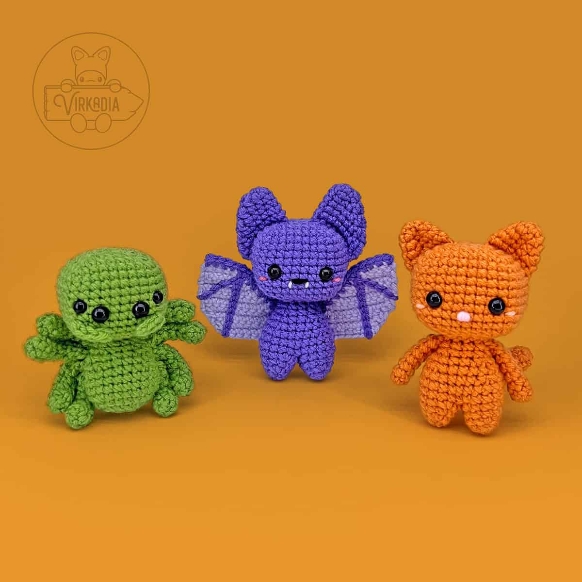 free crochet cat, crochet bat, and crochet spider amigurumi plushies for Halloween decorations, spooky holiday decor, DIY fall crafts, and handmade gifts