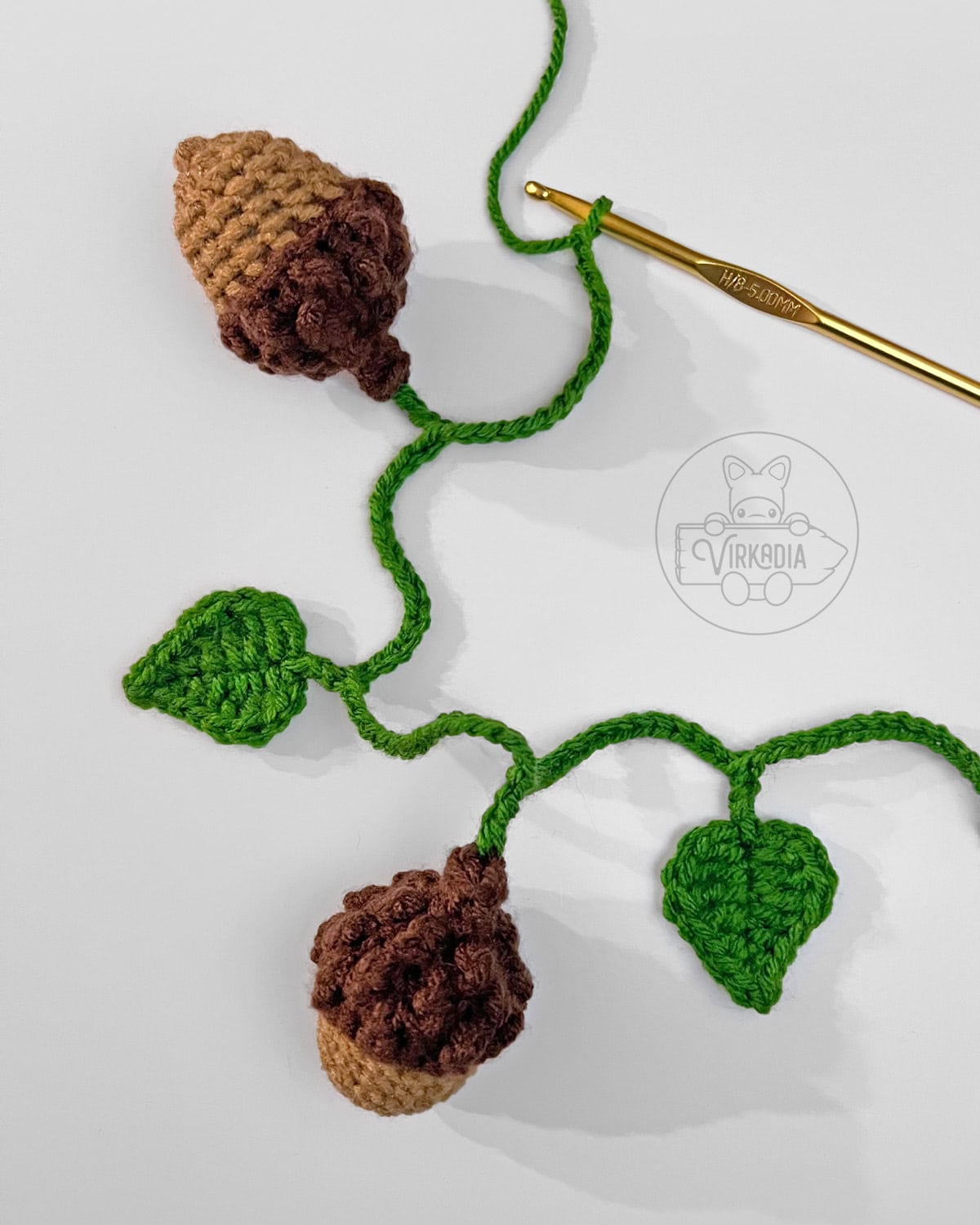 how to attach mini crochet acorn amigurumi into a garland