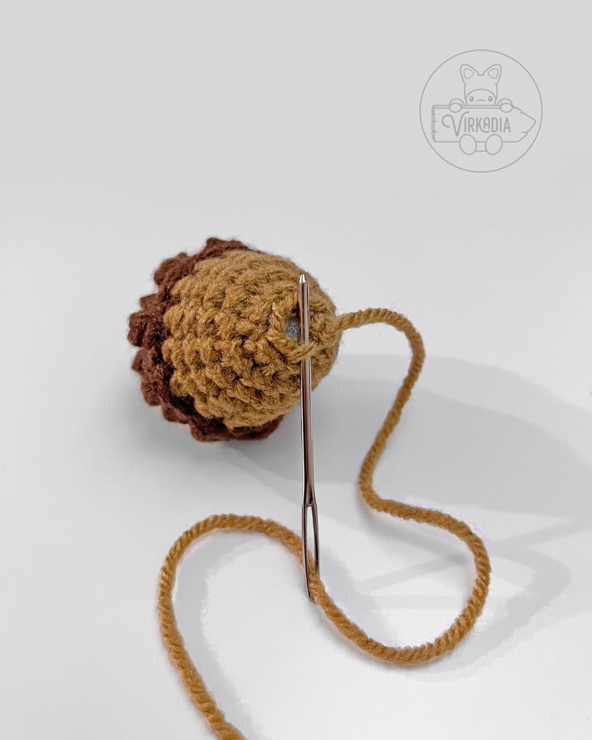 how to sew the mini crochet acorn amigurumi closed