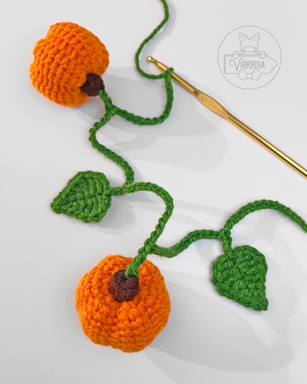 how to attach the mini crochet pumpkin amigurumi into a garland