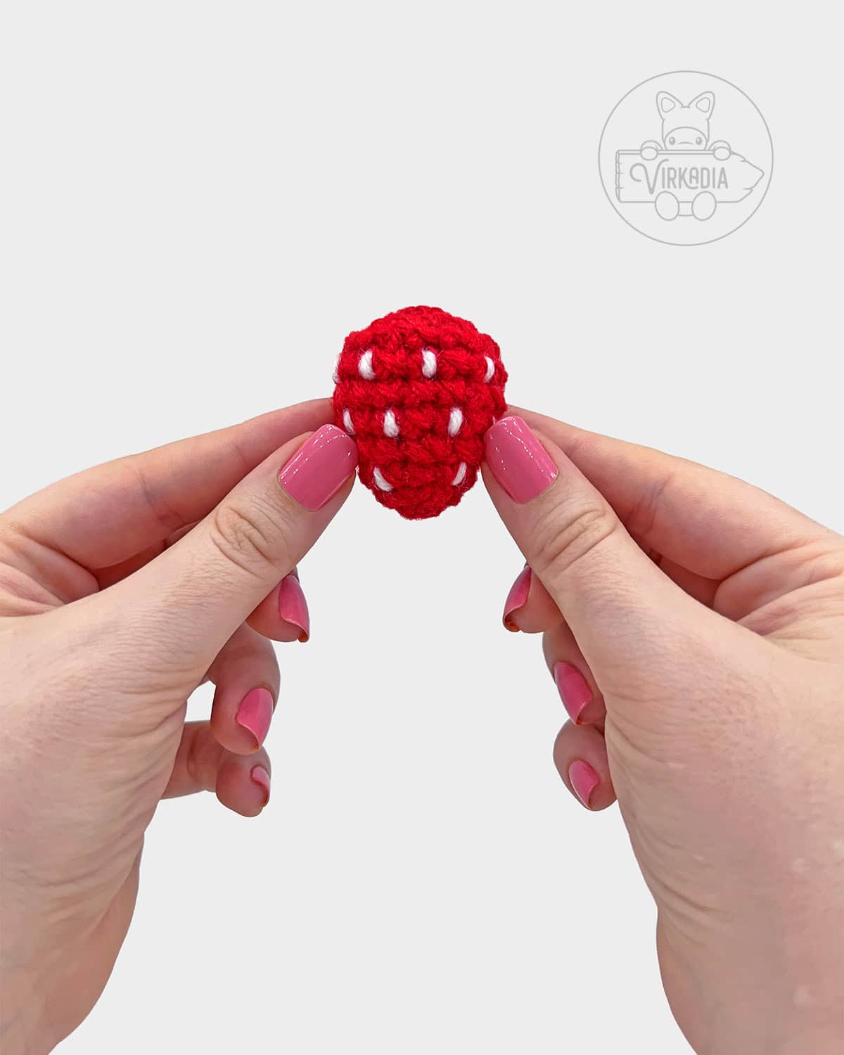 free crochet strawberry bookmark pattern tutorial of how the strawberry should look before adding the leaves
