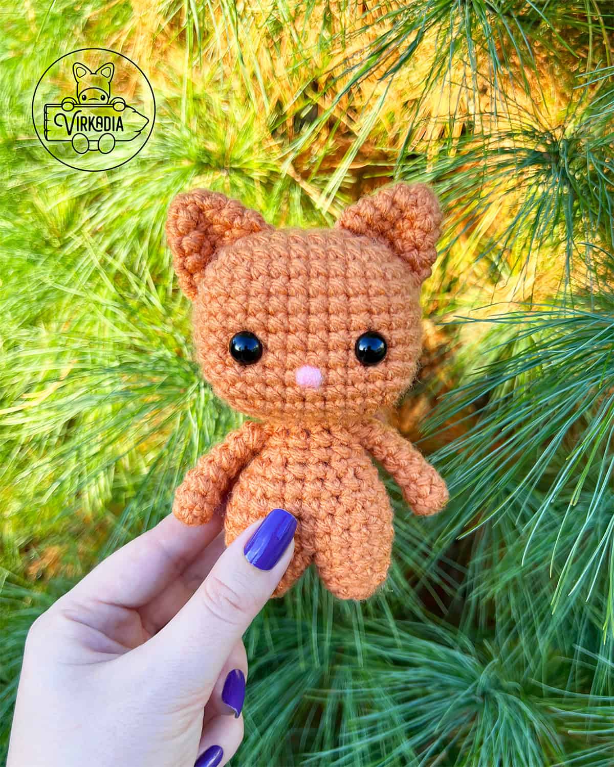 candid shot of free crochet cat amigurumi plushie for Halloween decorations, spooky home decor, fall crafts, and DIY animal gifts