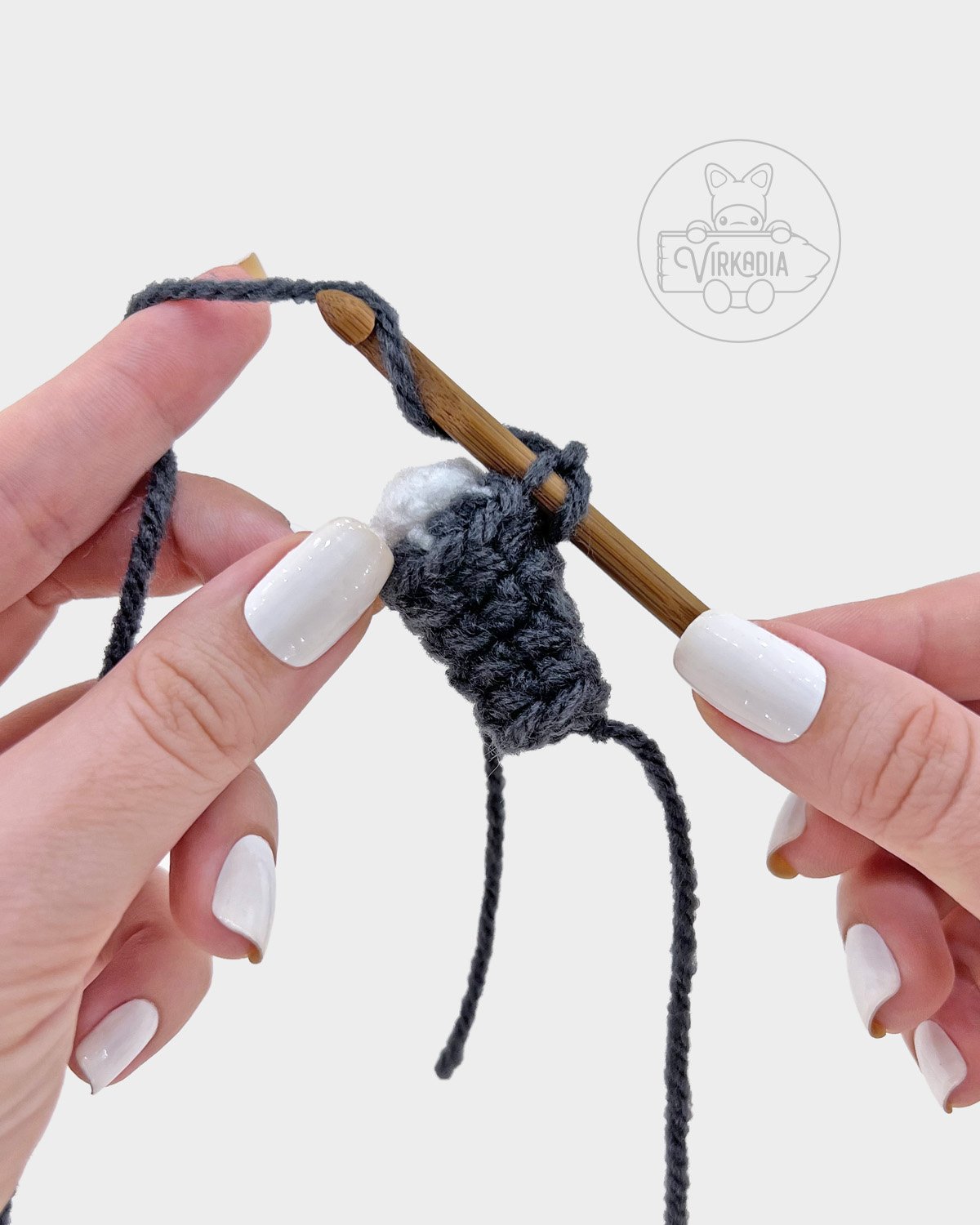 free amigurumi pattern tutorial of how to rejoin into the arm to create a sleeve