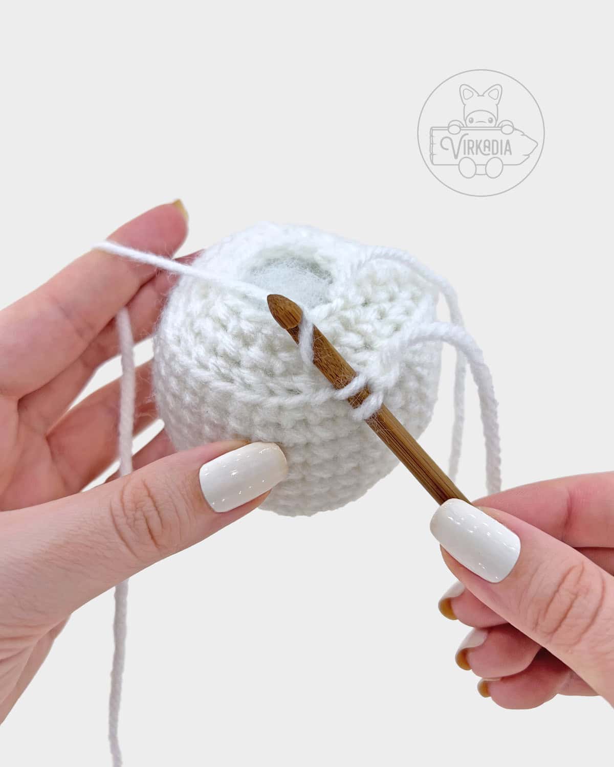 free amigurumi pattern tutorial of how to rejoin into the front loops of round 13