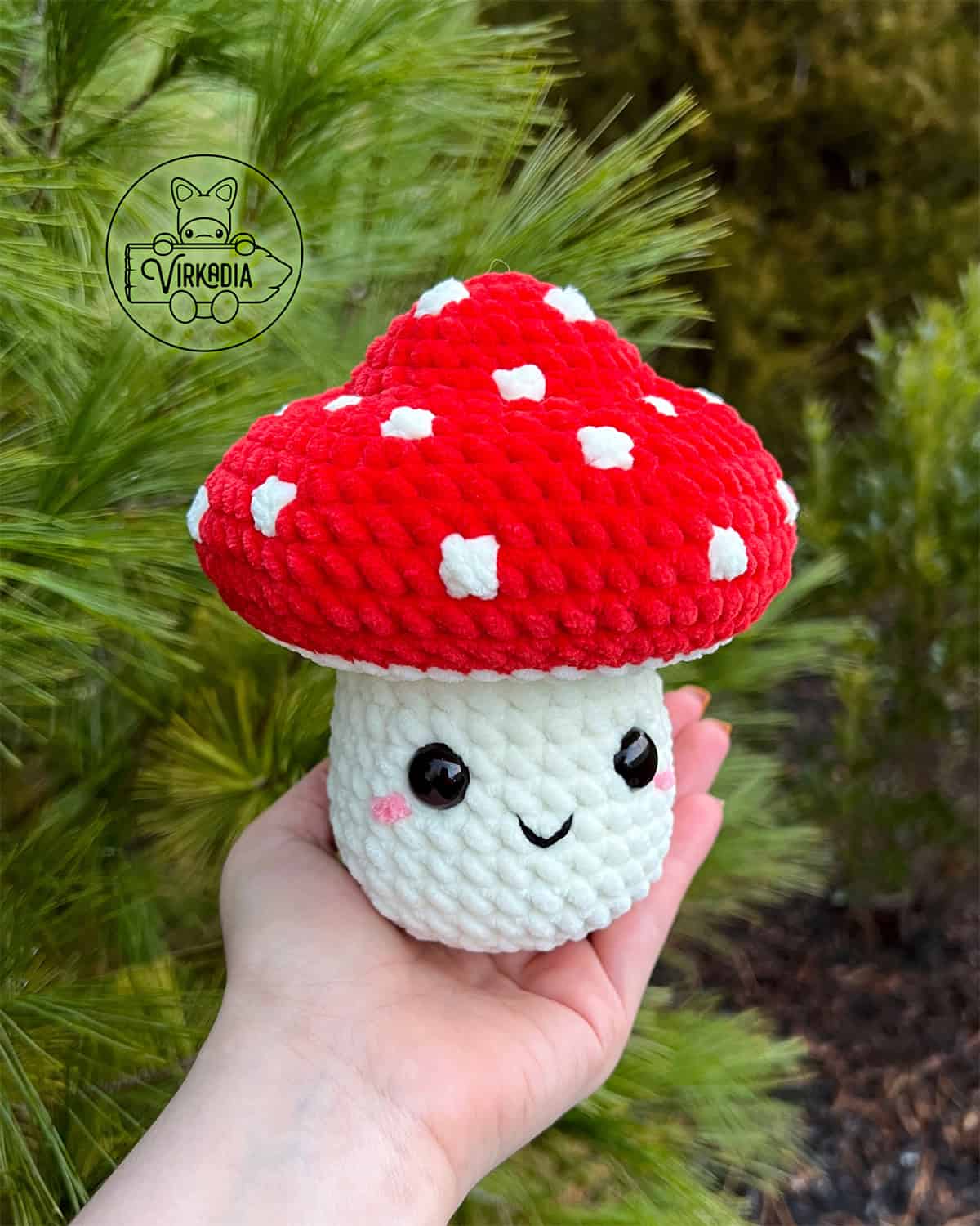 candid shot of free crochet mushroom amigurumi softie in chunky yarn for fall crafts, cottagecore, DIY fall decor, and handmade gifts