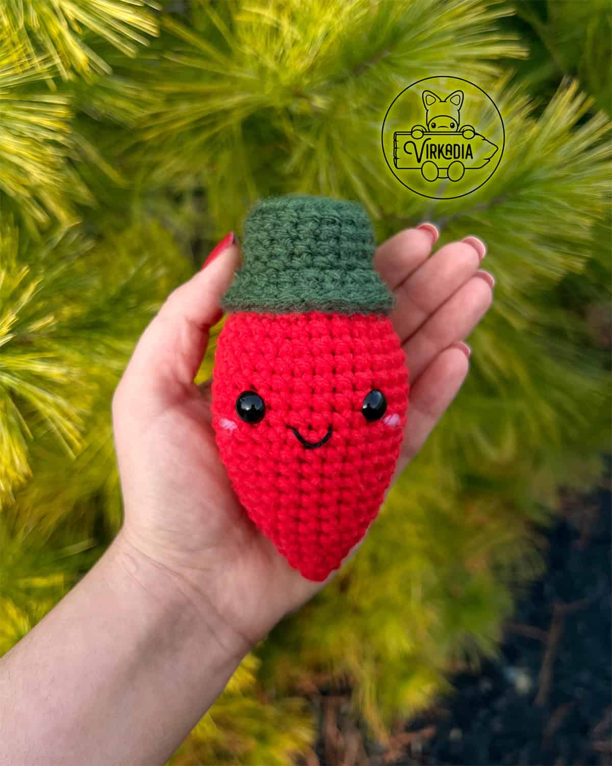 candid shot of crochet Christmas light amigurumi plushie for Christmas decorations, DIY winter decor, and handmade holiday gifts