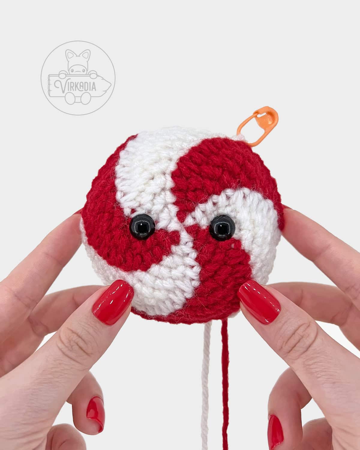 free crochet peppermint candy amigurumi pattern tutorial of where to attach the eyes