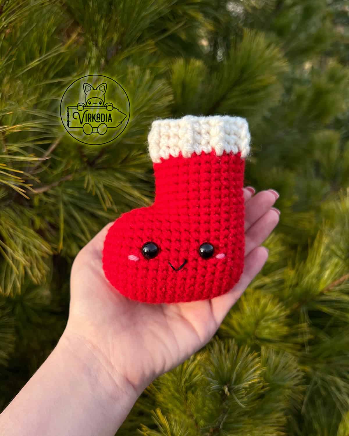 candid shot of crochet stocking amigurumi plushie for Christmas decorations, DIY winter decor, and handmade holiday gifts