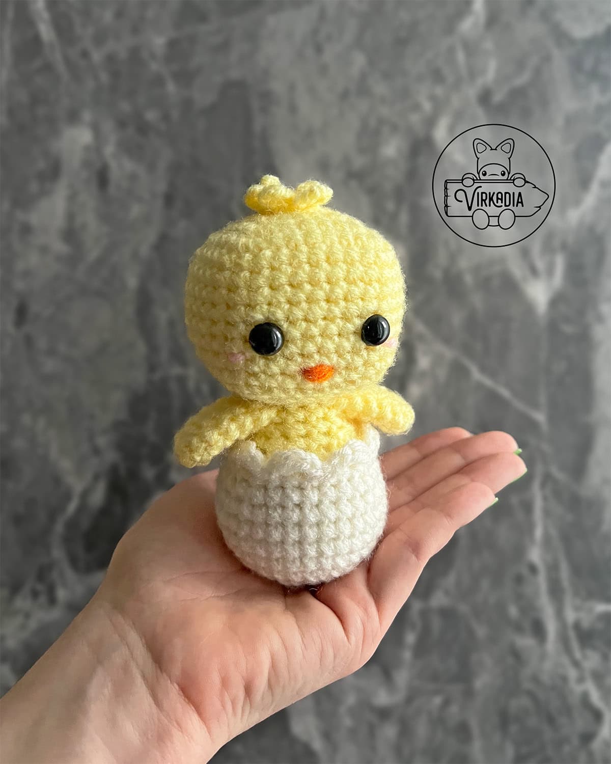 candid shot of free crochet chick amigurumi plushie for DIY Easter decorations, homemade holiday gifts, animal decor, and spring crafts
