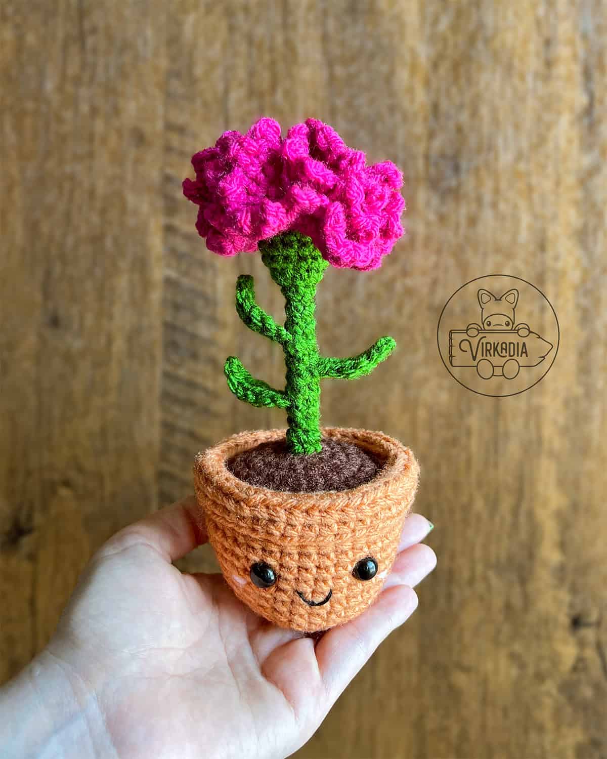 candid shot of free crochet carnation amigurumi plushies for DIY Valentine's Day, anniversary gifts, Mother's Day, and teacher appreciation