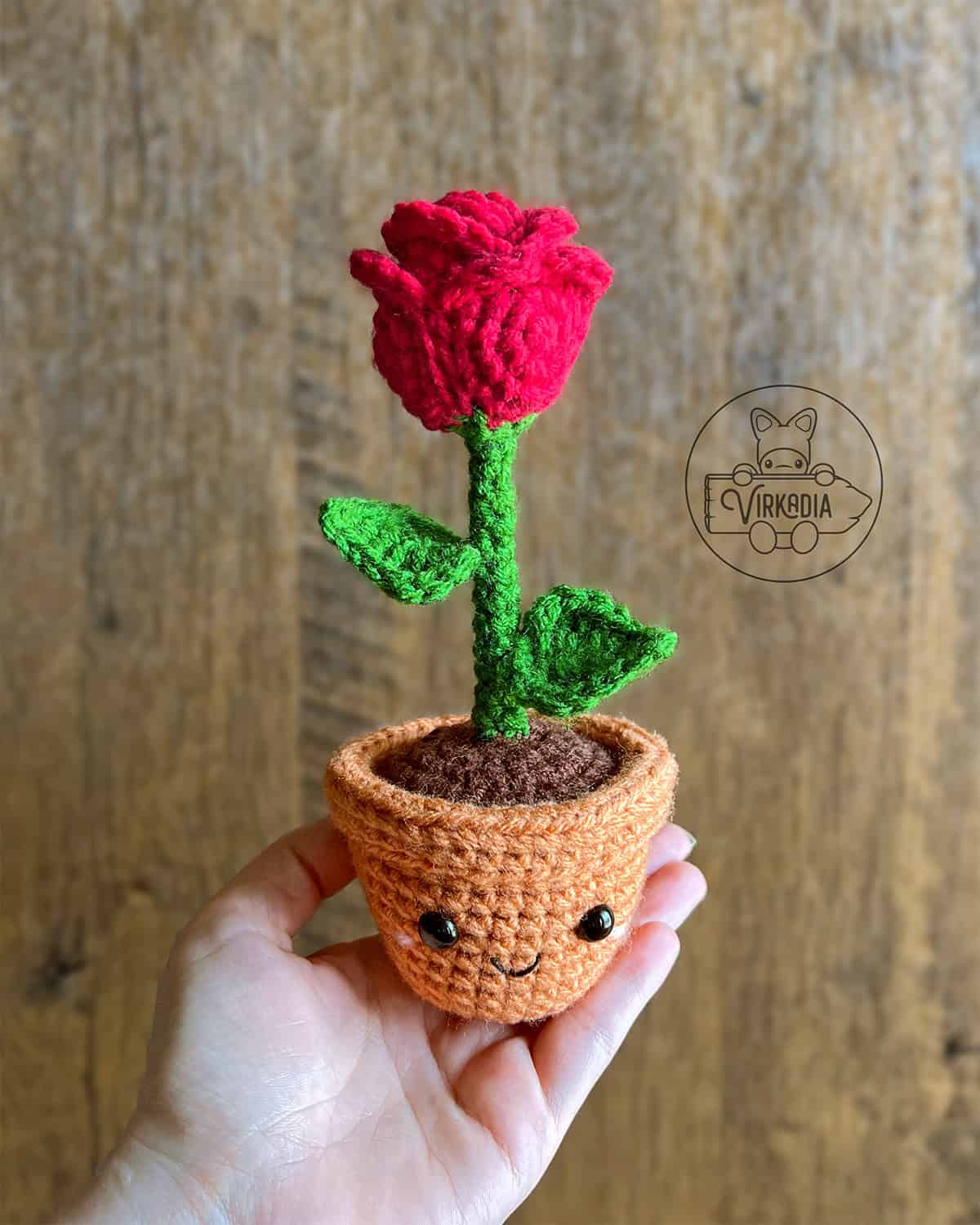 candid shot of free crochet rose amigurumi plushies for DIY Valentine's Day, anniversary gifts, Mother's Day, and teacher appreciation