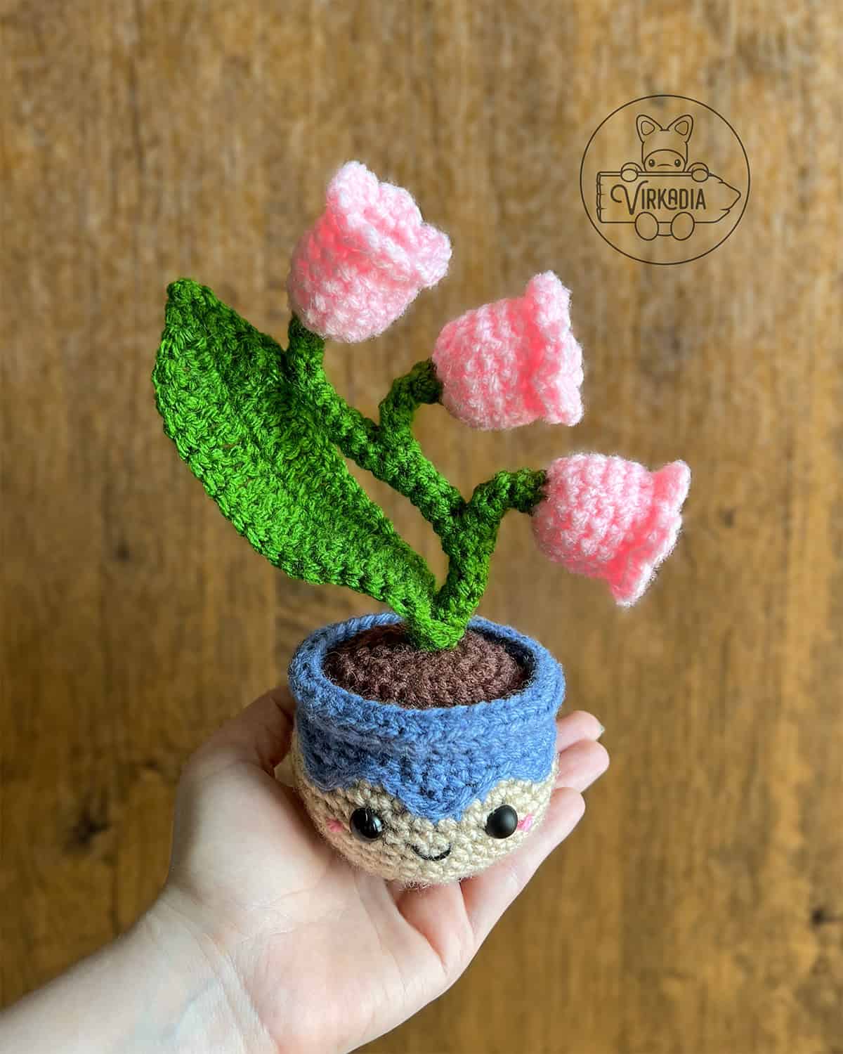 candid shot of free crochet lily of the valley amigurumi plushie for floral decorations, DIY gifts, spring crafts, and plant decor