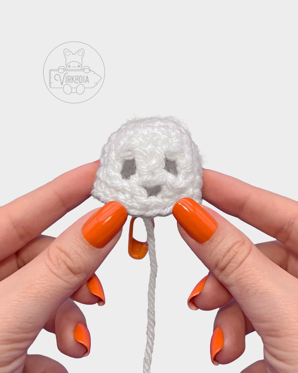 free crochet ghost keychain tutorial of how the face should look