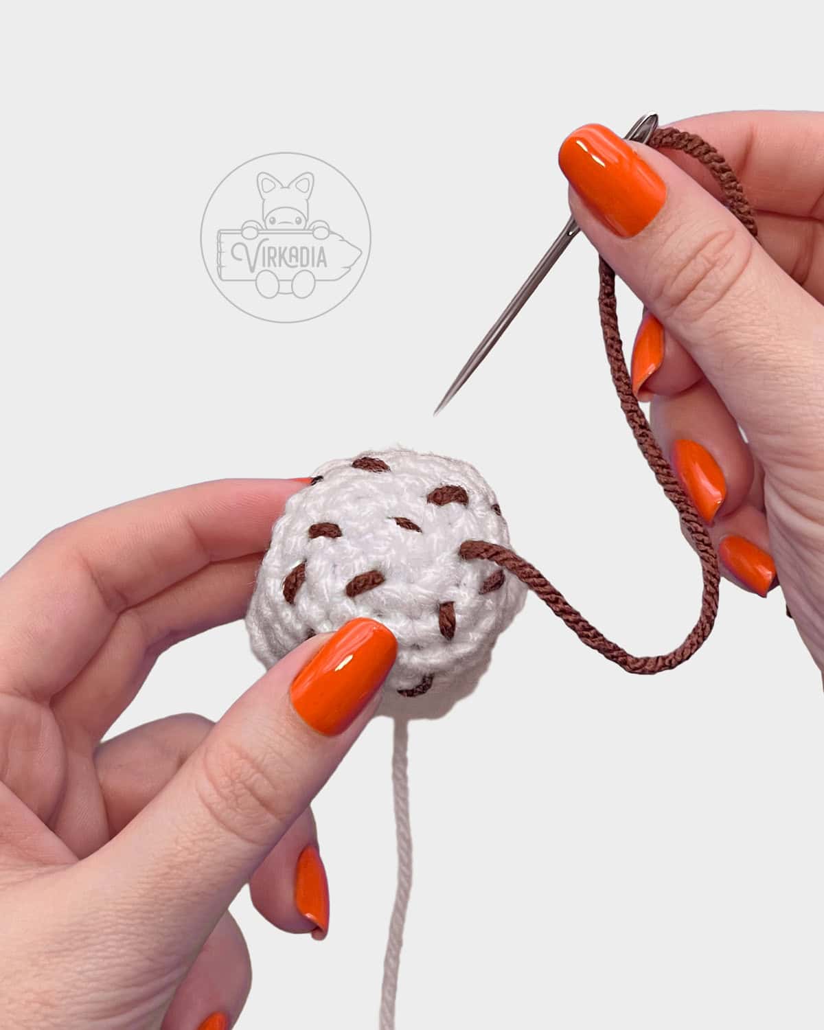 free amigurumi keychain tutorial of how to embroider the sprinkles