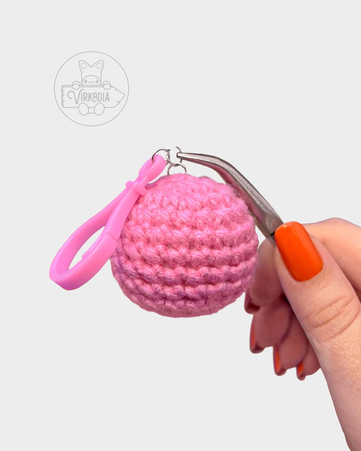 free crochet keychain tutorial of how to attach the jump rings to the clip