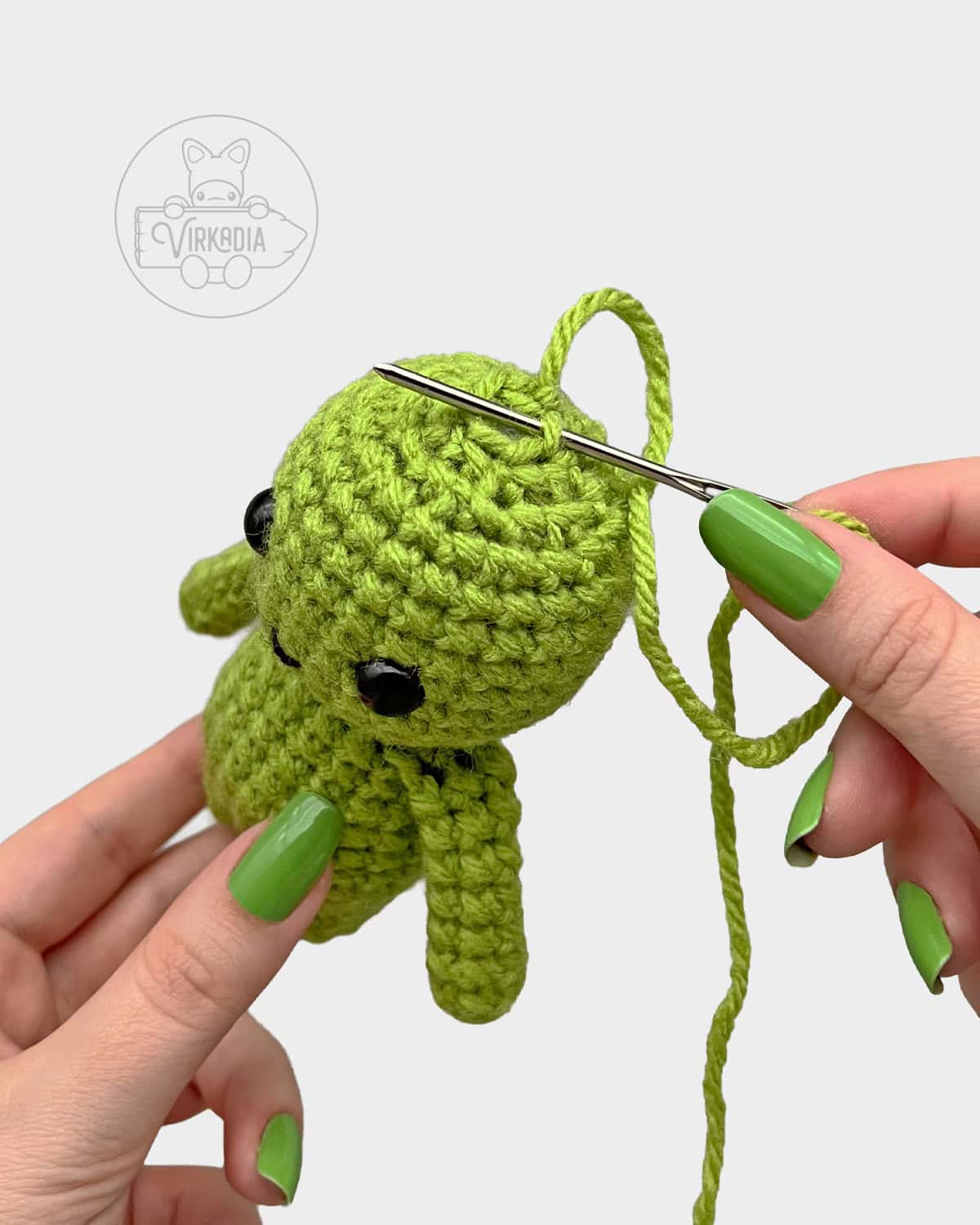 free Little Crochet Guy doll tutorial of how to sew the top of the head closed