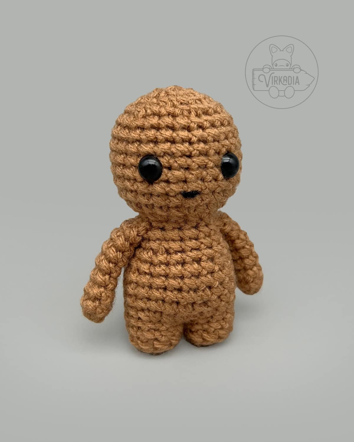 free Little Crochet Guy pattern in a solid tan color for DIY doll making, seasonal amigurumi projects, and holiday gifts