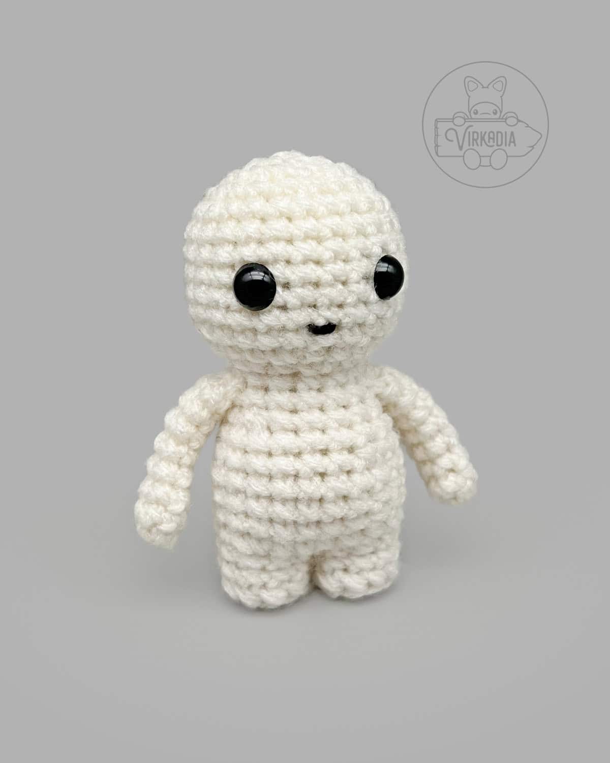 free Little Crochet Guy pattern in a solid white color for DIY doll making, seasonal amigurumi projects, and holiday gifts