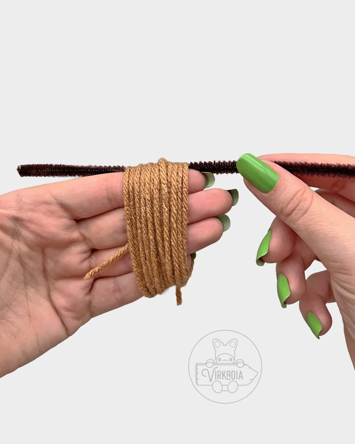free doll accessories tutorial of how to insert the pipe cleaner into the yarn bundle
