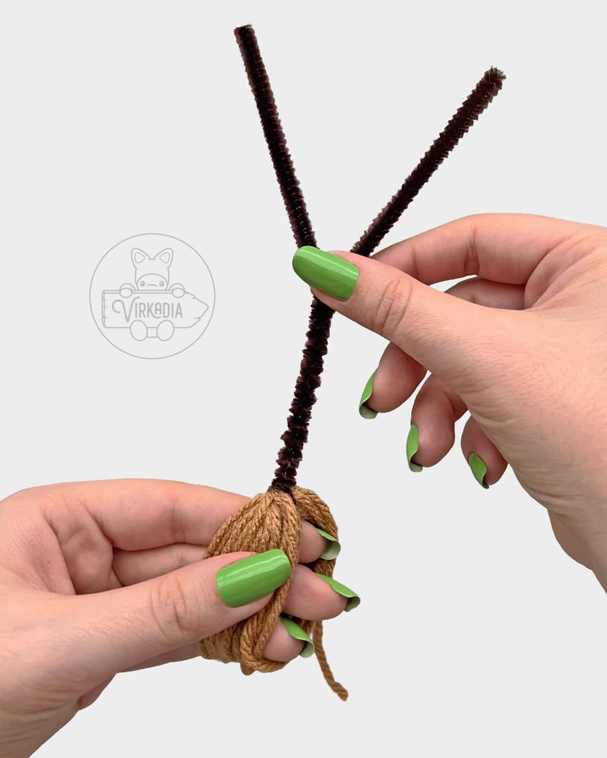 free Little Witch Guy crochet doll tutorial of how to twist the pipe cleaner together to form the broom handle